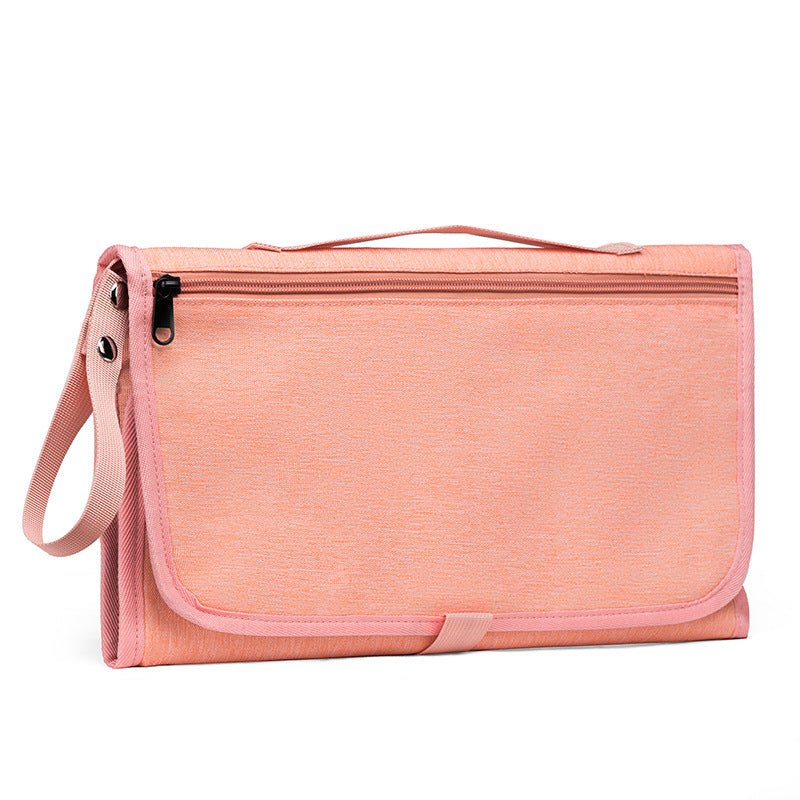 Trocador de fralda impermeável, dobrável e portátil.