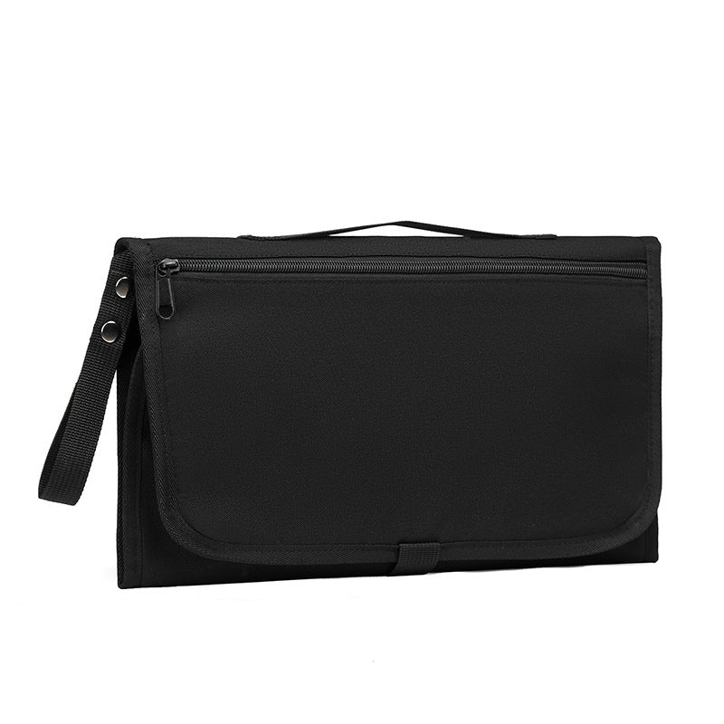 Trocador de fralda impermeável, dobrável e portátil.